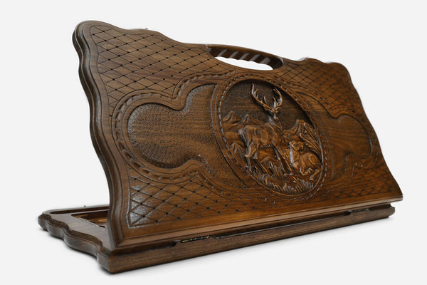 Carved beechwood backgammon board with a deer medallion and a carry handle, propped open