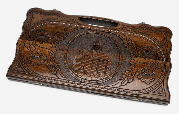 Carved beechwood backgammon board with the Geghard Monastery in a medallion, propped open