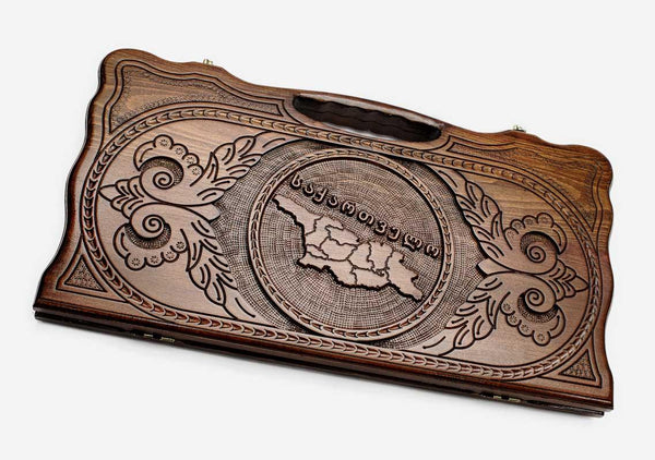Carved beechwood backgammon board with the map of Georgia in a medallion, propped open