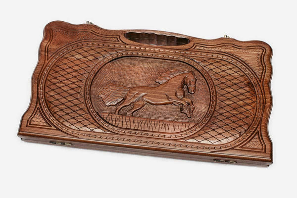 Carved beechwood backgammon board with a horse medallion and a carry handle, propped open