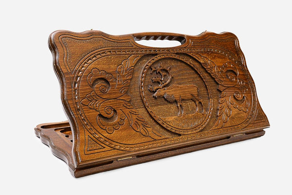 Carved beechwood backgammon board with a stag medallion and a carry handle, propped open