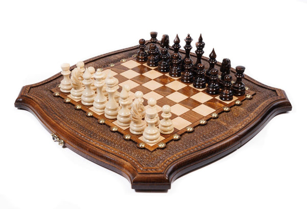 Wooden chess set with contour outline and stippled carved border in beech wood — by Hrachya Ohanyan