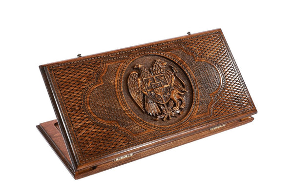 A frontal shot of the closed Armenian Coat of Arms classic backgammon board showing the detailed eagle and lion relief carving.