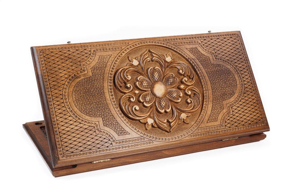 A frontal shot of the closed Ornamental classic backgammon board by Hrachya Ohanyan showing the detailed geometric carvings.