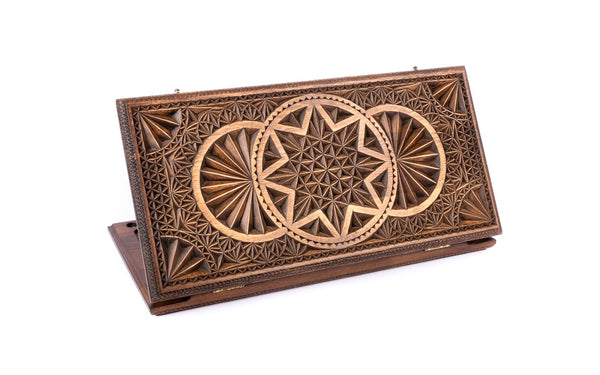 Luxury chip-carved backgammon set closed, two rings and an eight-pointed star in facets on the lid, 23.6 inch / 60 cm