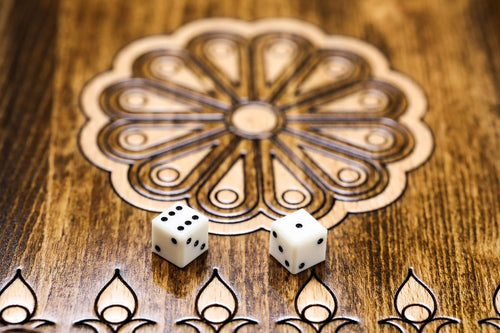 Hand-carved Mount Ararat, clouds and cypress on a wooden backgammon board lid