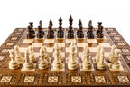 Close-up of the detailed carpet motif carvings and solid wood finish on this 2-in-1 classic board.