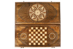 Front cover with the leaf ornament above the back cover with the chequerboard, seen from above