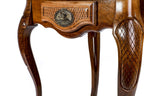 Detail of the carved edge on the contour-outline table