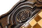 Detail of the wood grain and hand-polished finish on the Assyrian backgammon board