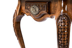 Close-up of the carved edge on the chess table