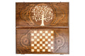 Armenian backgammon set half open, pomegranate Tree of Life lid above the carved reverse side