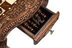 Floral-carved contour-outline chess table detail