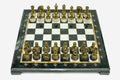 Green and cream marble chess set with hand-cast bronze pieces arranged for play and brass coordinate medallions
