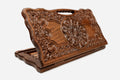 Carved beechwood backgammon board with baroque floral ornament and a carry handle, propped open