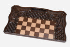 The large carved folding chess set shown closed, ready to carry