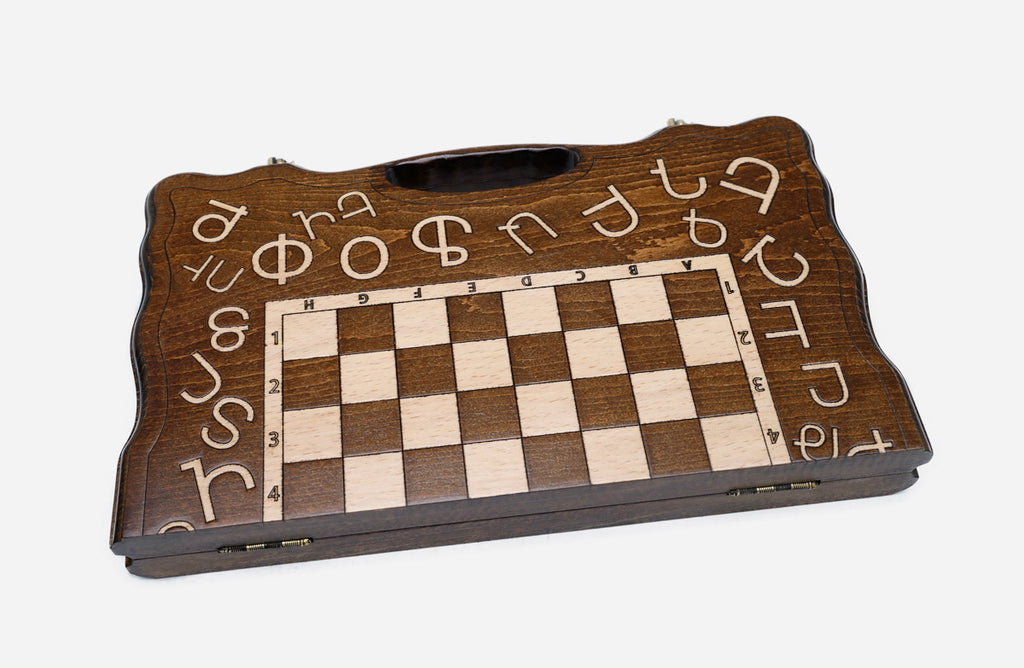 Close-up of the Armenian alphabet carving on the beech board