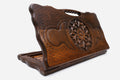 Carved beechwood backgammon board with a floral medallion and a carry handle, propped open