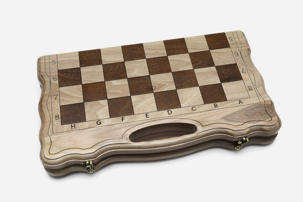 Close-up of the black metal chess pieces
