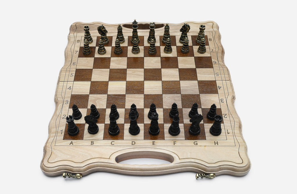 Folding wooden chess board with figural bronze pieces - a gold army facing a black army in starting position