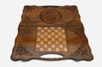 Angled view of the rosette medallion carved backgammon board
