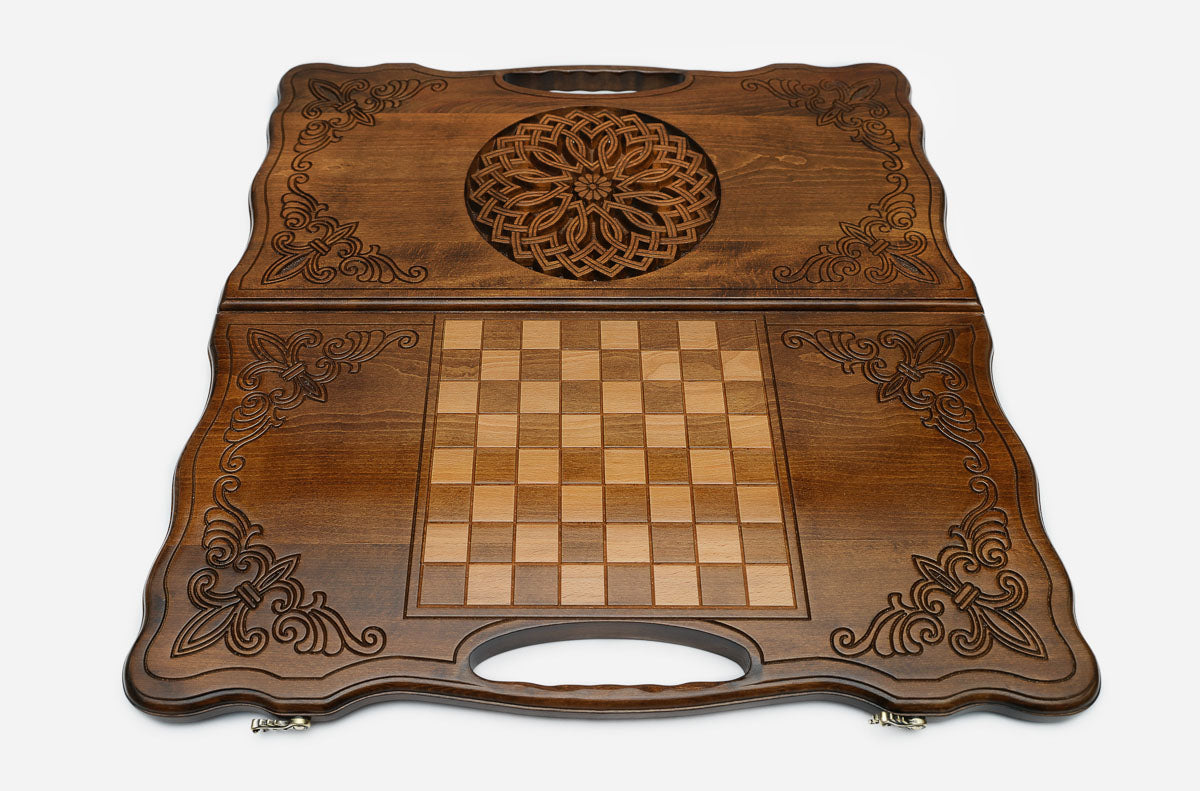 Angled view of the rosette medallion carved backgammon board