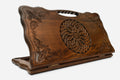 Carved beechwood backgammon board with an ornate rosette medallion and a carry handle, propped open