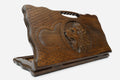 Carved beechwood backgammon board with a roaring lion medallion and a carry handle, propped open