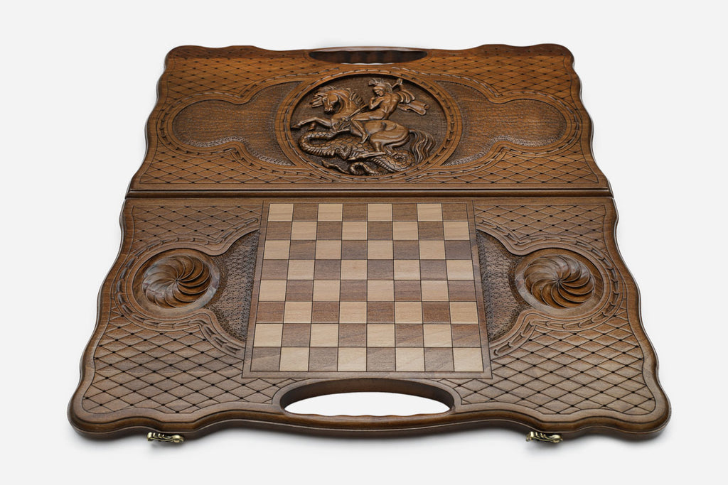 Angled view of the Saint George carved backgammon board