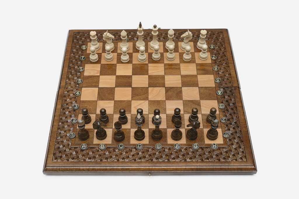 Lattice chess and backgammon set shown folded with carry handle