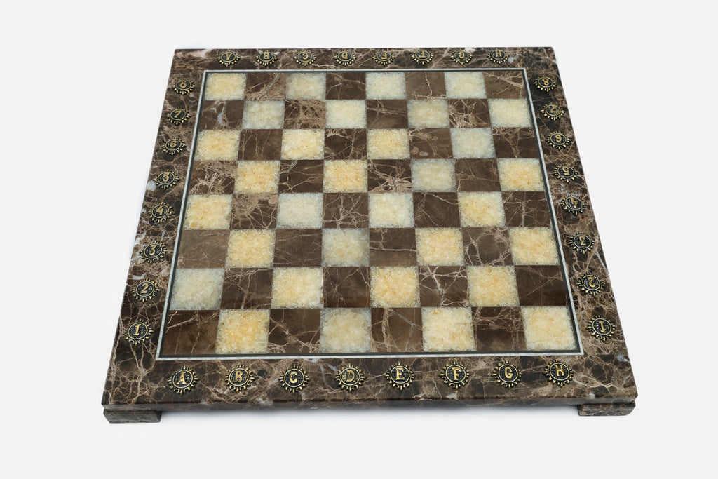 Overhead view of the brown Emperador marble chessboard with cream and brown squares