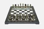 Black marble chess set with hand-cast bronze pieces arranged for play and brass coordinate medallions