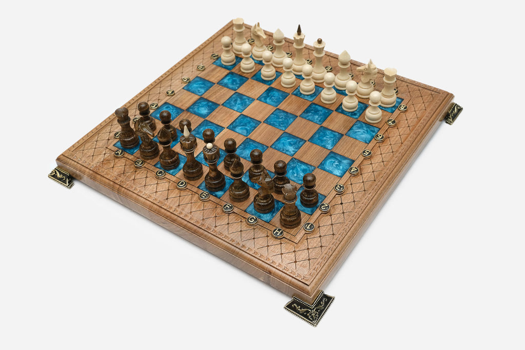 Overhead view of the blue epoxy board and full set of pieces