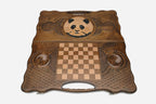 Angled view of the panda carved backgammon board