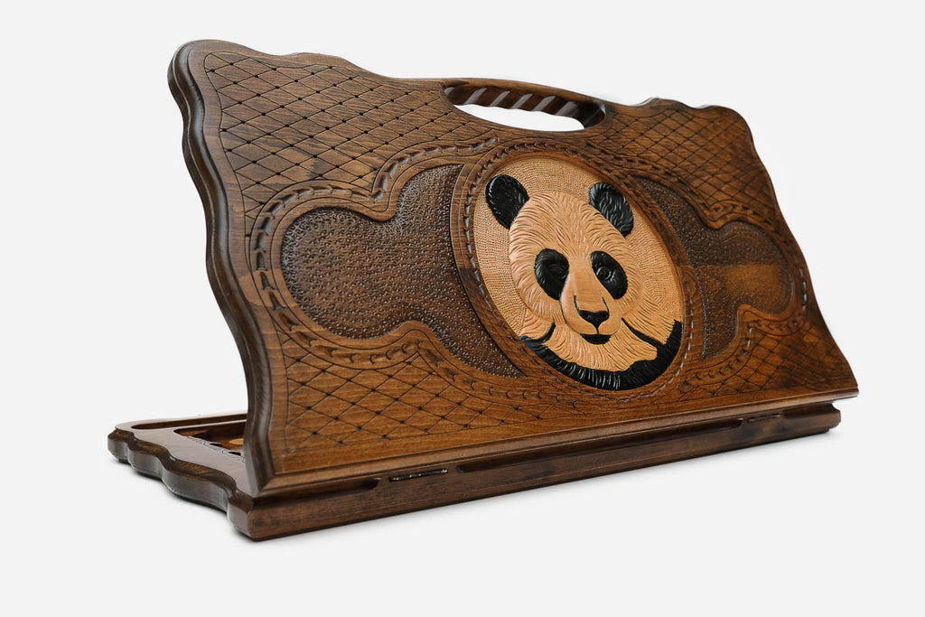 Carved beechwood backgammon board with a panda medallion and a carry handle, propped open