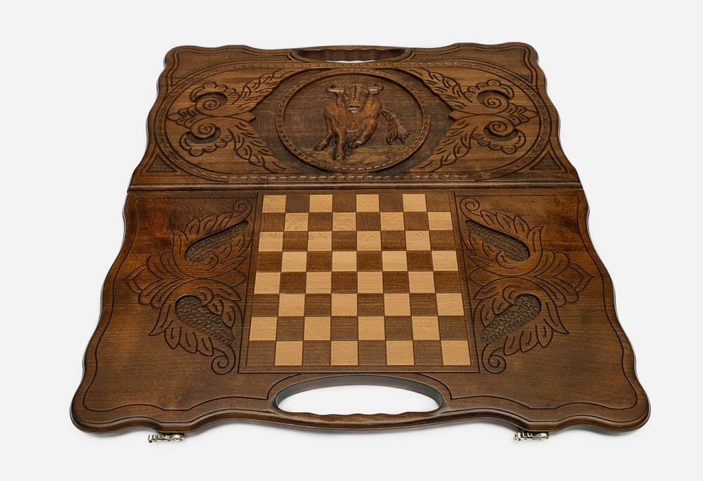 Angled view of the ox carved backgammon board