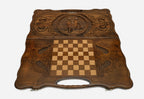 Angled view of the ox carved backgammon board