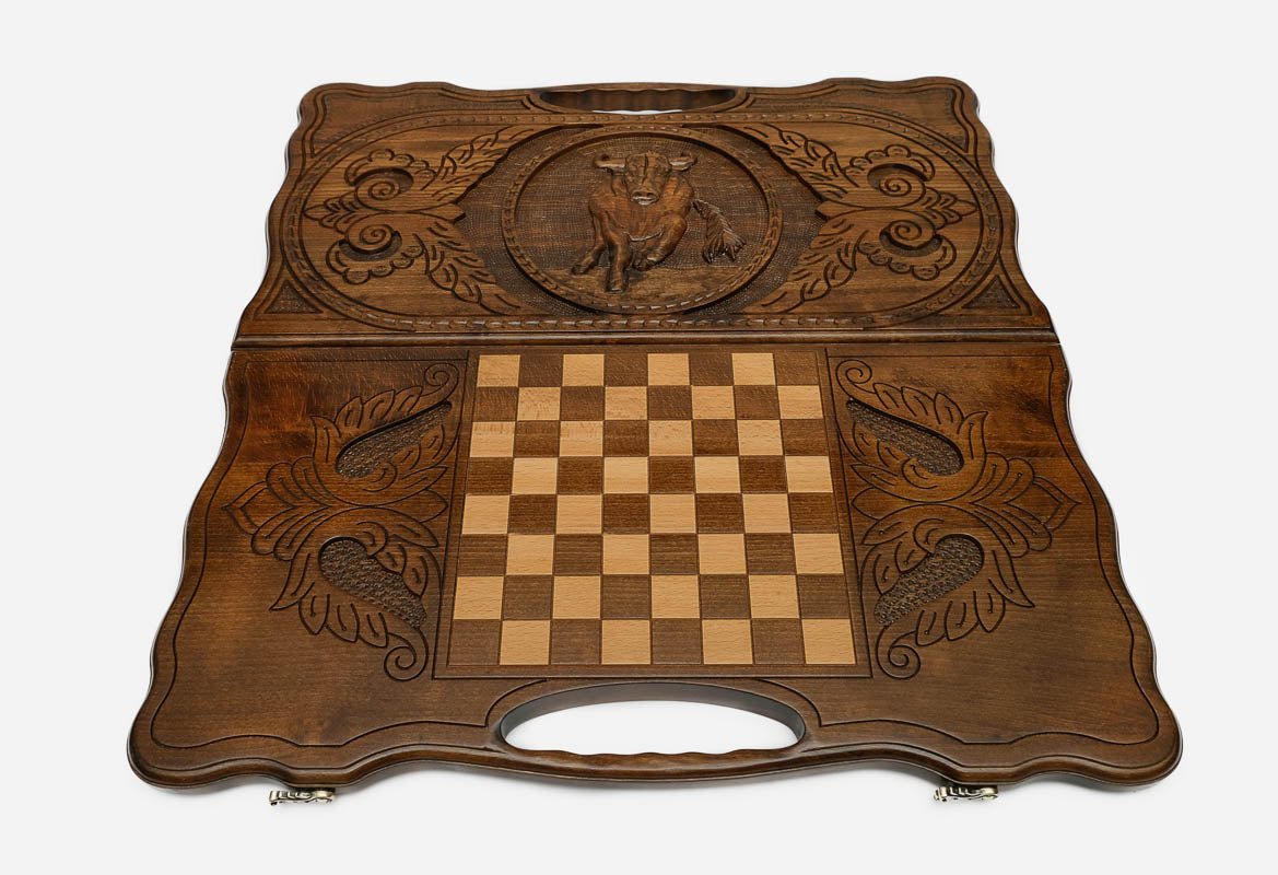 Angled view of the ox carved backgammon board