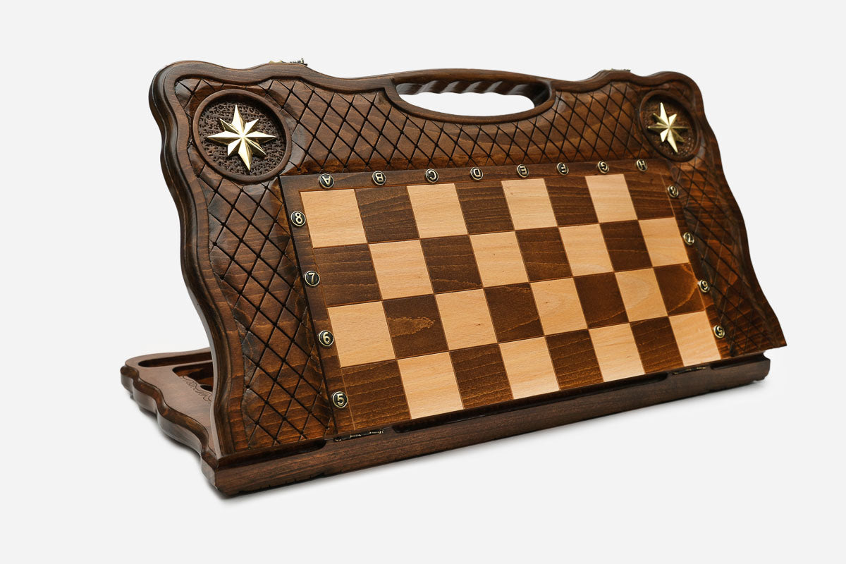 Angled view of the bronze-star chess set with its metal figural pieces