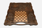 Angled view of the Georgia emblem carved backgammon board