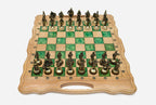 Light beechwood folding chess board with green marbled epoxy squares and ornate bronze figural soldier pieces