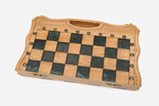 The gray epoxy chess set shown from an angle
