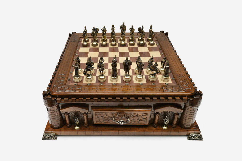 Handle Chess Castle set up for play with bronze pieces, front angled view