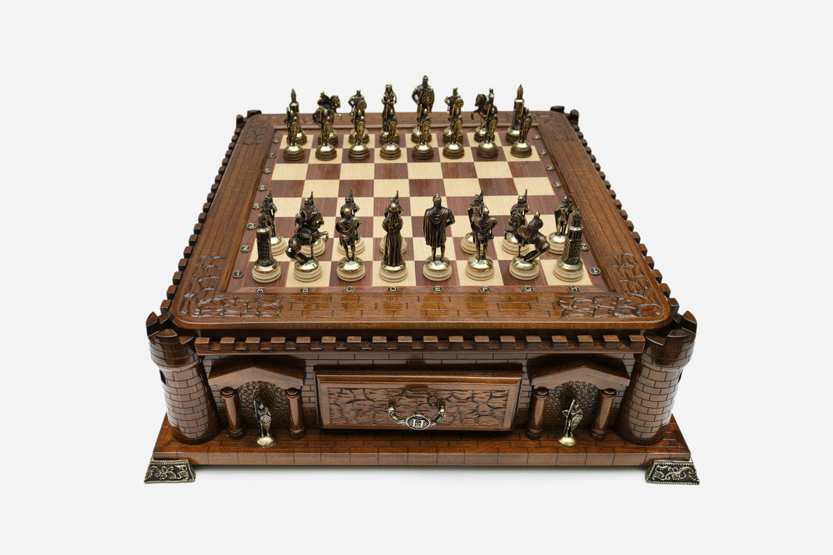 Handle Chess Castle set up for play with bronze pieces, front angled view