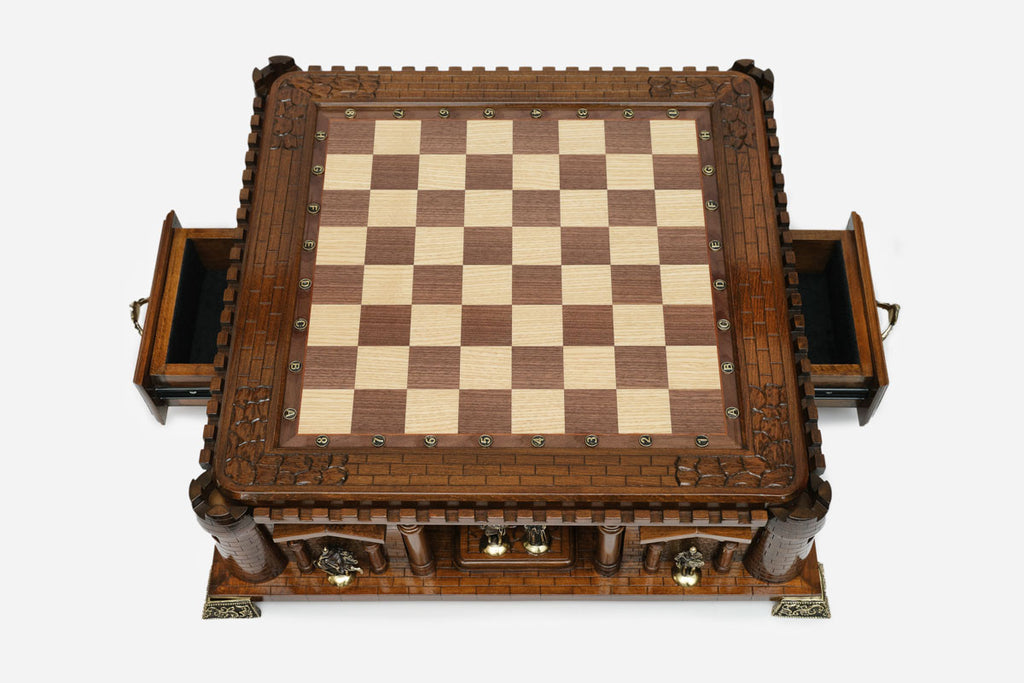 Handle Chess Castle with both side drawers open, empty board, top-down view