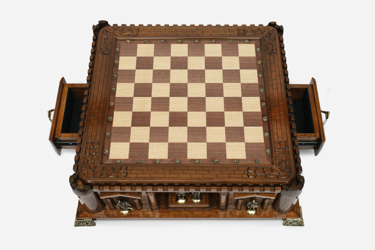 Handle Chess Castle with both side drawers open, empty board, top-down view