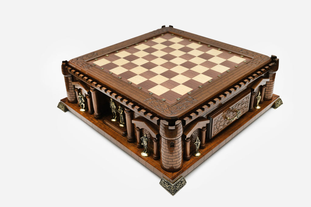 Handle Chess Castle empty board, three-quarter angled view showing the castellated turrets