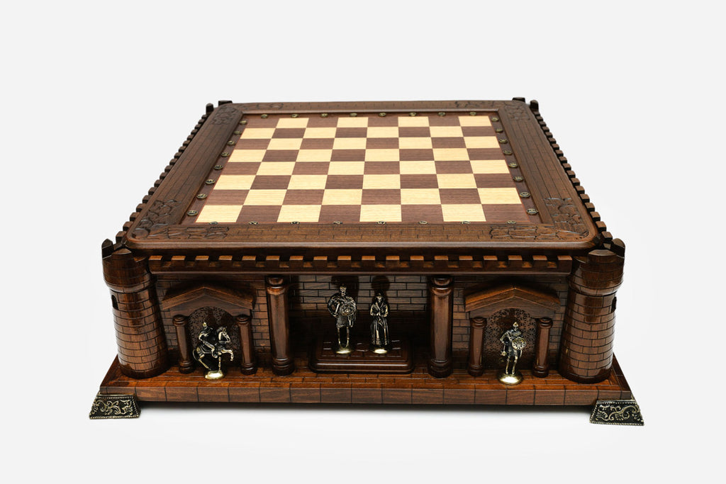 Handle Chess Castle front view showing bronze knight and royal figures in the archways