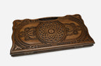 Detail of the scrollwork and border carving