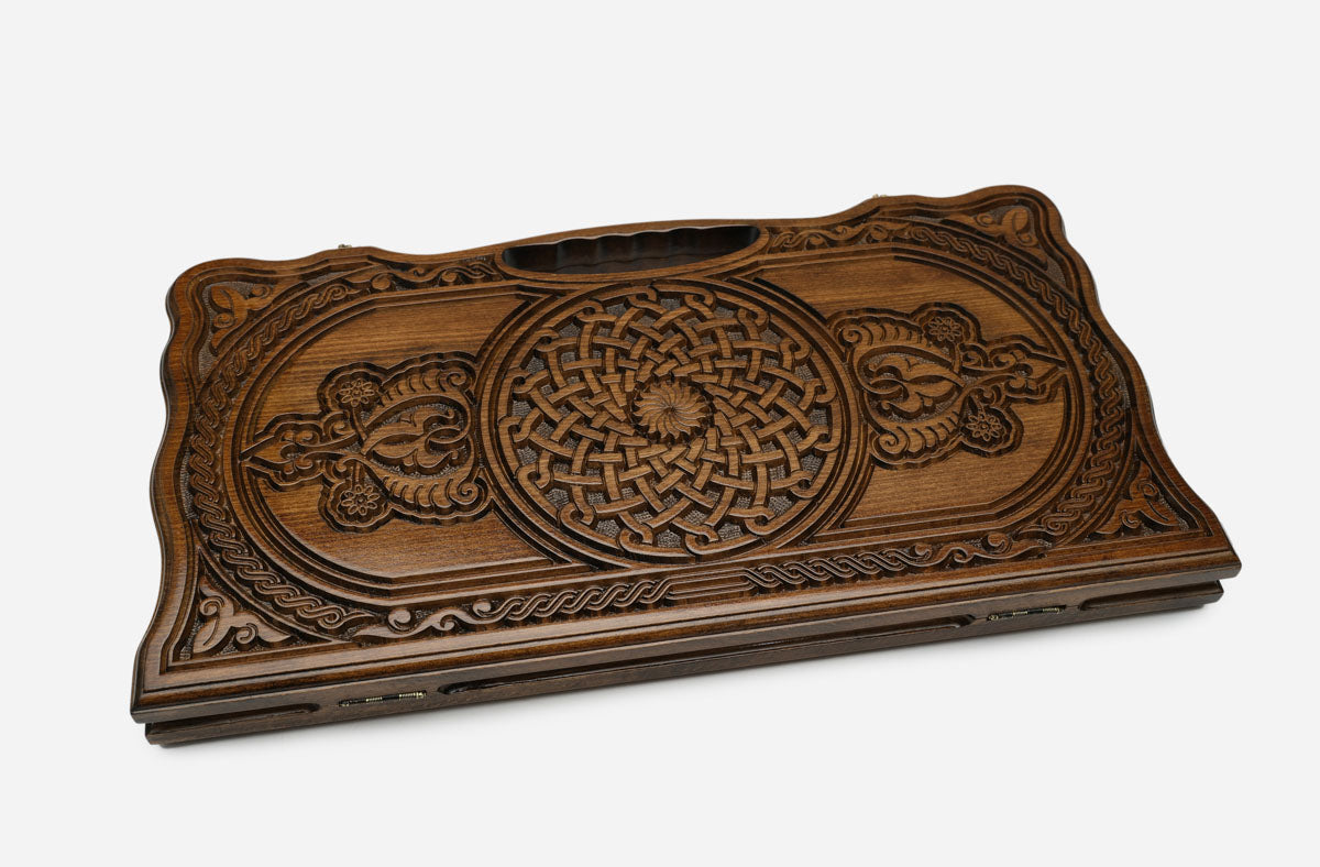 Detail of the scrollwork and border carving